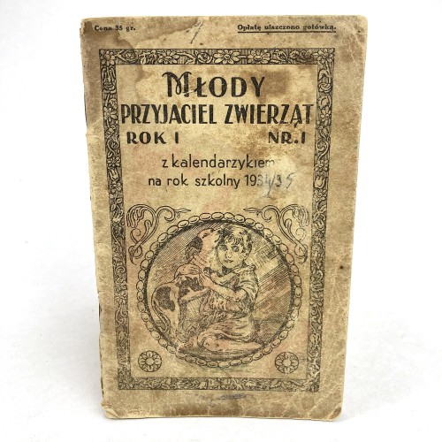 Młody przyjaciel zwierząt z kalendarzykiem na rok szkolny 1934/35.
